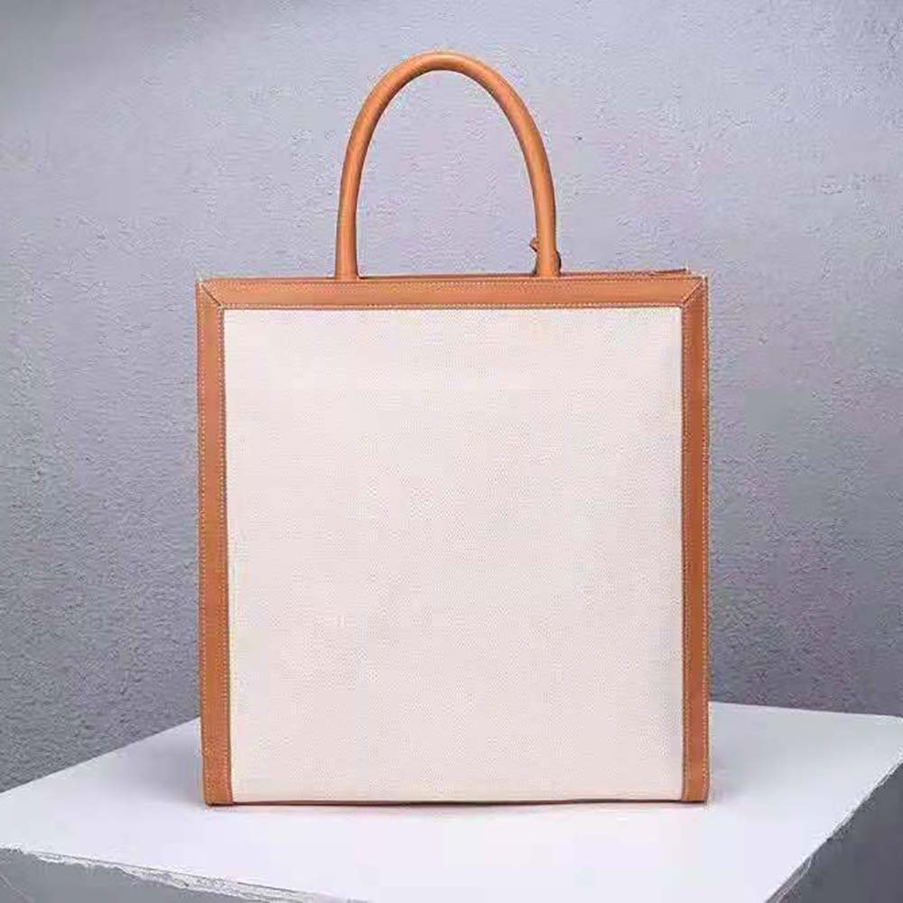 Side profile highlighting silhouette and leather trim of Celine Women Vertical Cabas Celine