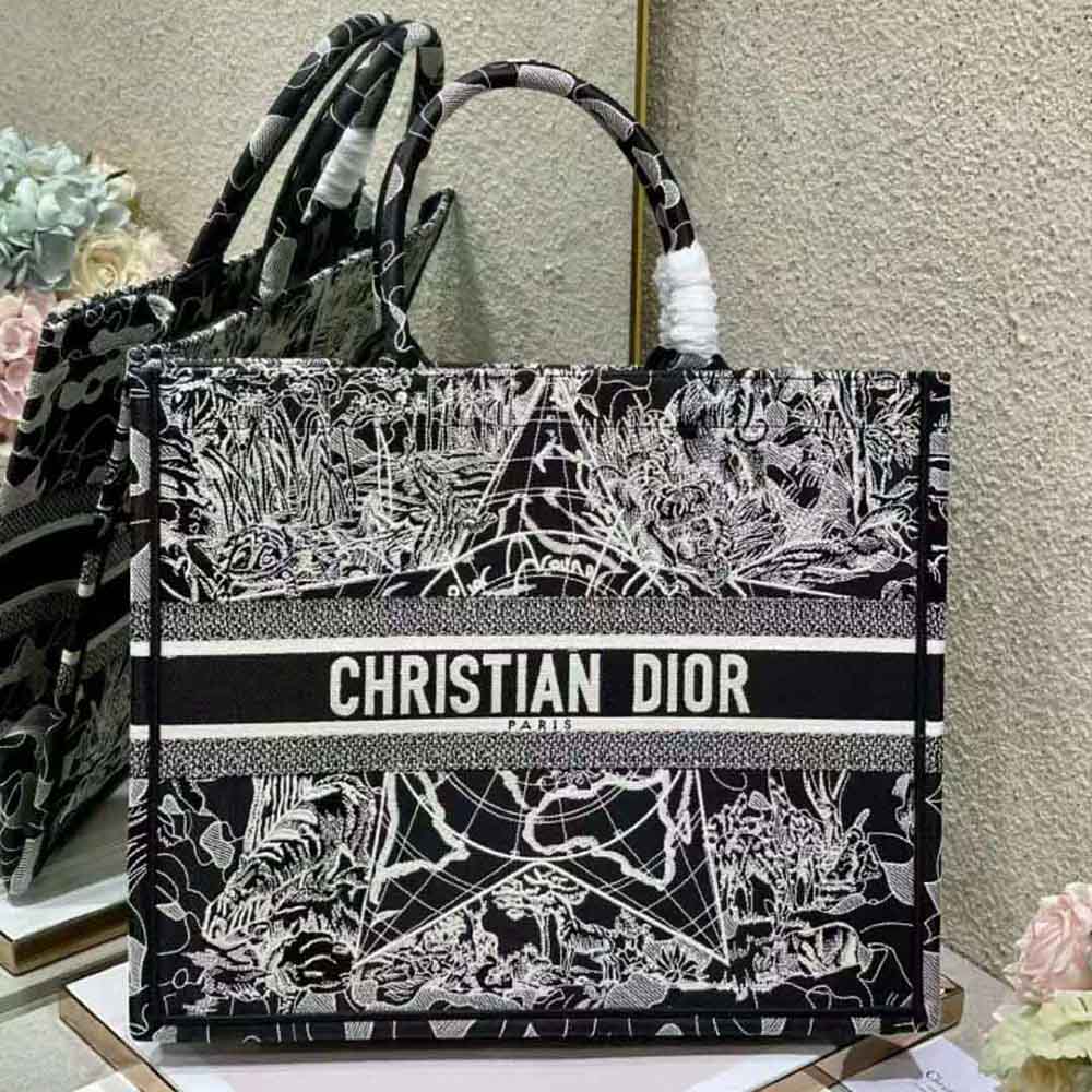 Close-up of Dior embroidery on black and white canvas tote