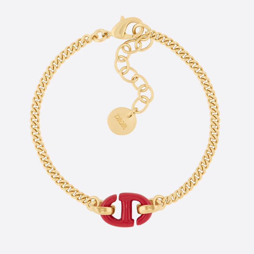 Close-up of Dior Women CD Navy Bracelet gold-finish metal and red lacquer