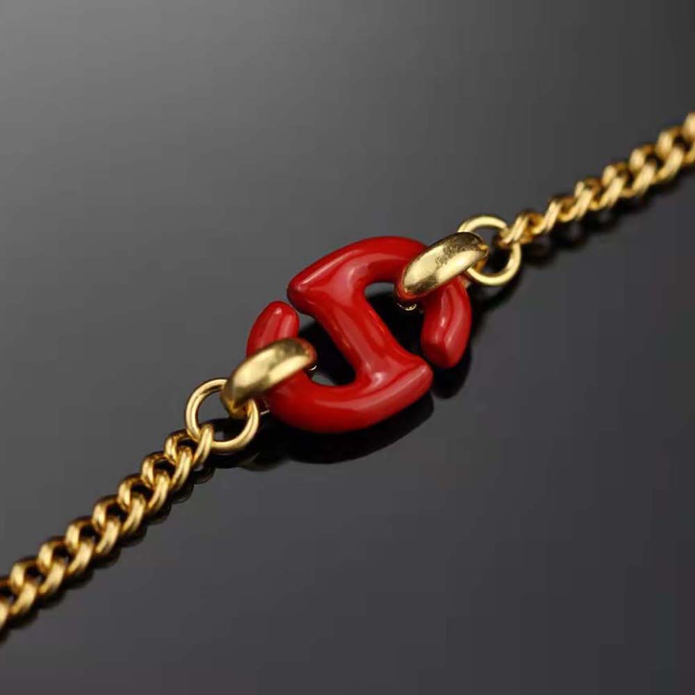 Model wearing Dior Women CD Navy Bracelet with signature CD logo detail