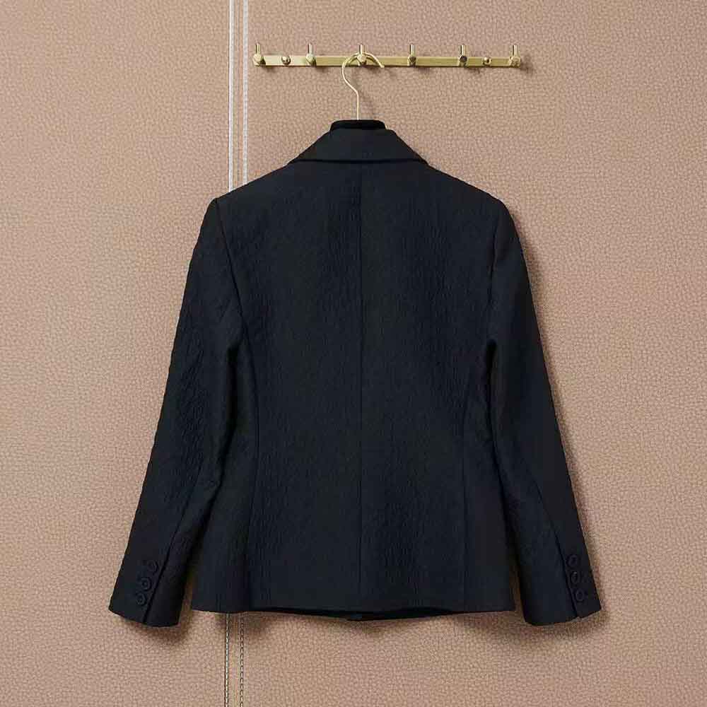 Side profile highlighting tailored silhouette of Dior Women Cloque-Effect Bar Jacket
