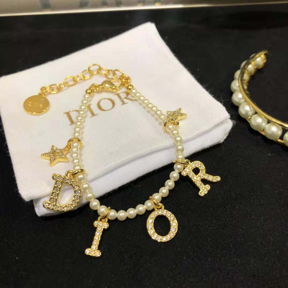 Side view of Dior Women Dio(r)evolution Bracelet with signature hardware