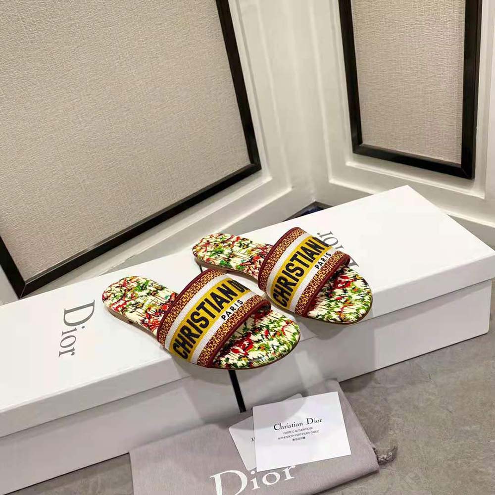 Close-up of green Toile de Jouy embroidery on Dior Women Dway Slide sandal