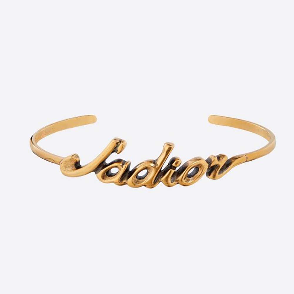 Close-up of Dior Women J’Adior Bracelet antique gold metal detail