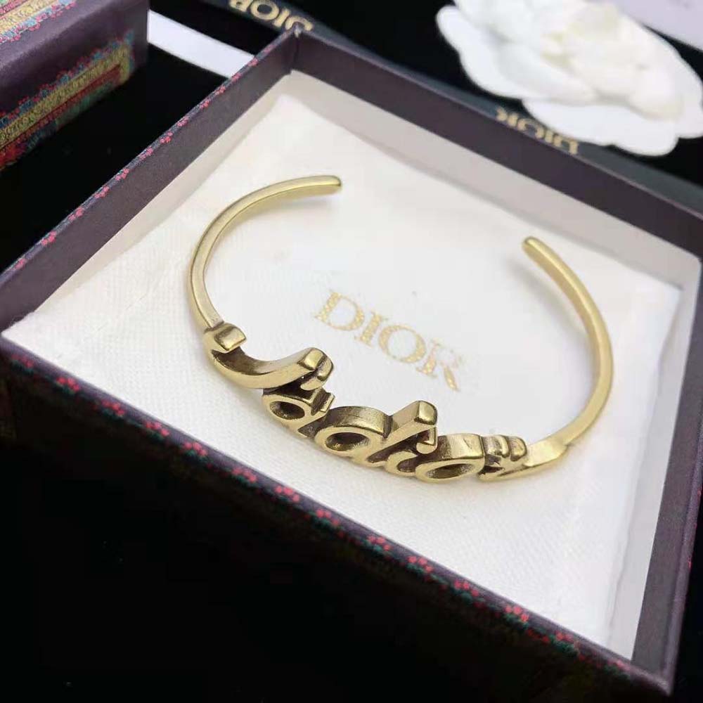 Styled shot of Dior Women J’Adior Bracelet on wrist with soft lighting