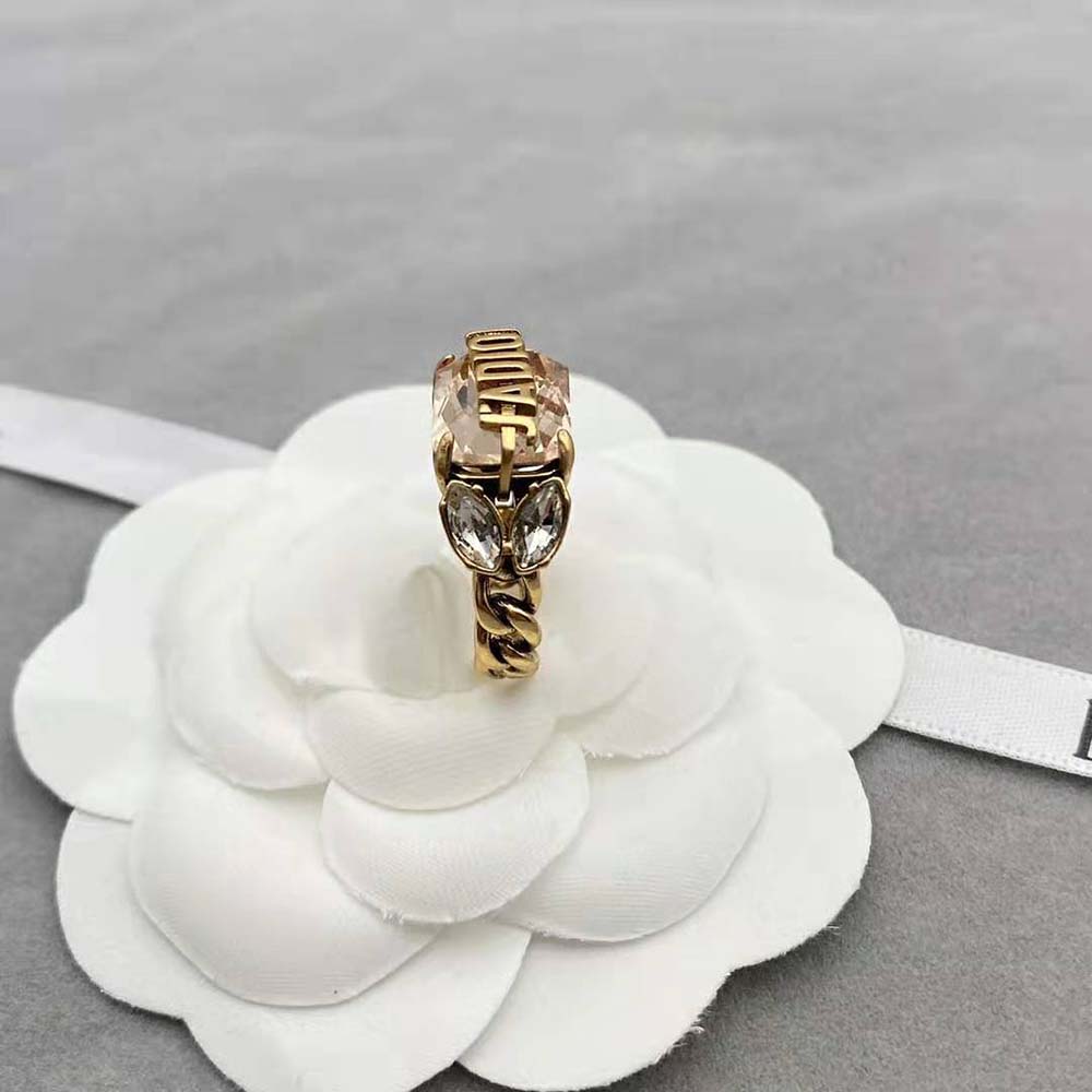 Side angle showing adjustable silhouette of Dior Women J’Adior Ring in gold metal