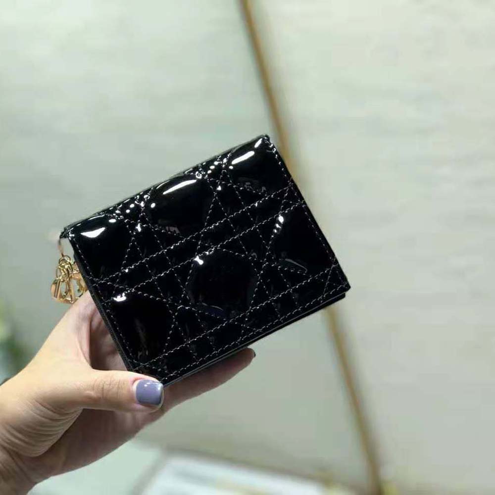 Side angle showing compact size of Dior Women Mini Lady Dior Wallet