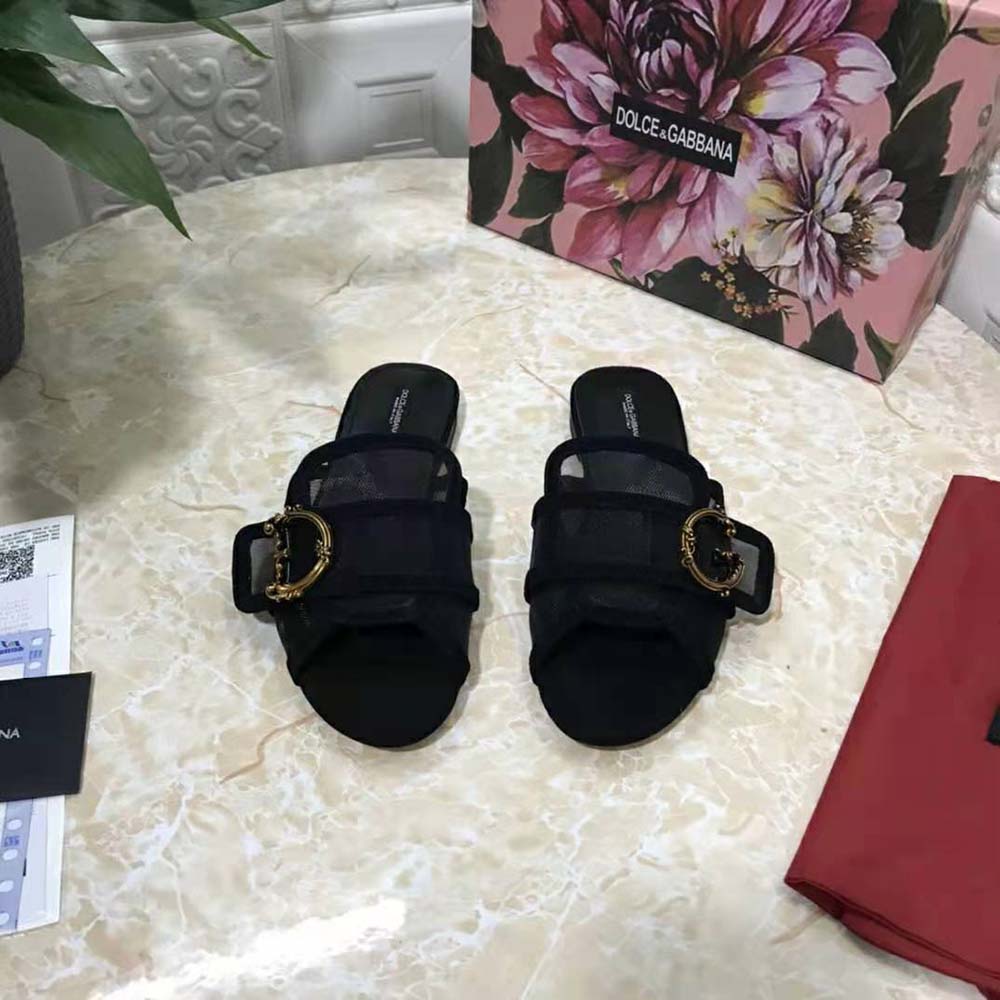 Close-up on gold Baroque DG logo hardware on Dolce Gabbana D&G Women Mesh Mules