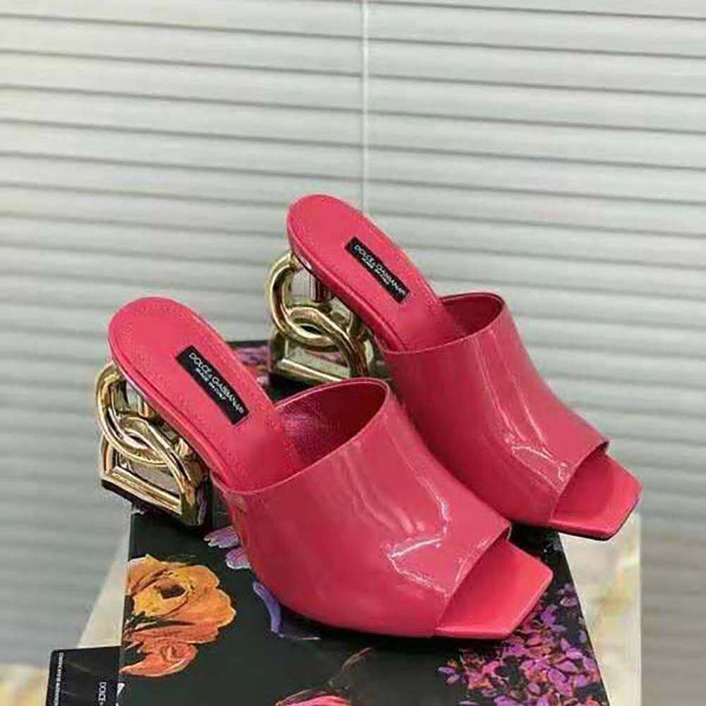Rear angle showing signature DG pop heel detail on pink leather mules