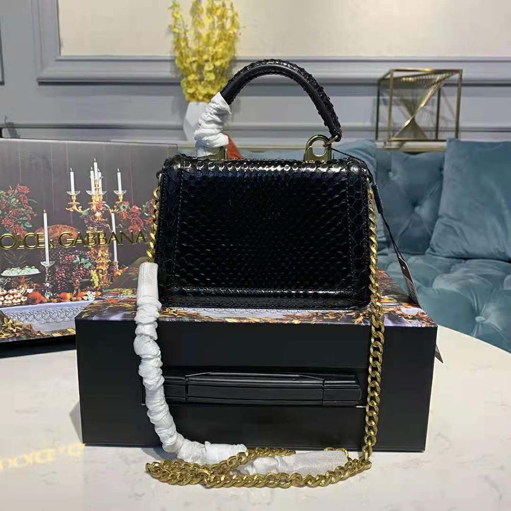 Side angle showing structured silhouette of Dolce Gabbana D&G Small Devotion Bag