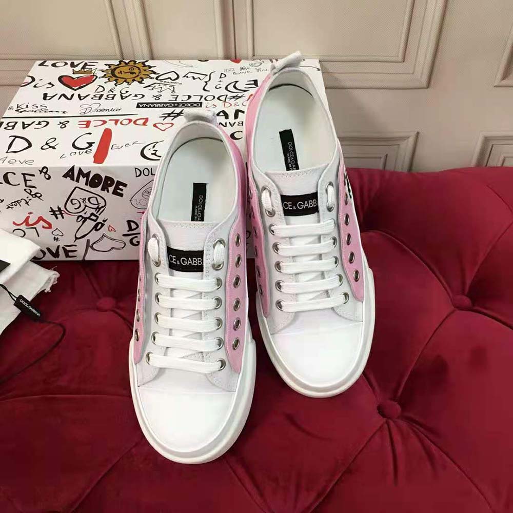 Overhead shot showing pink two-tone canvas and white sole of Dolce Gabbana sneakers
