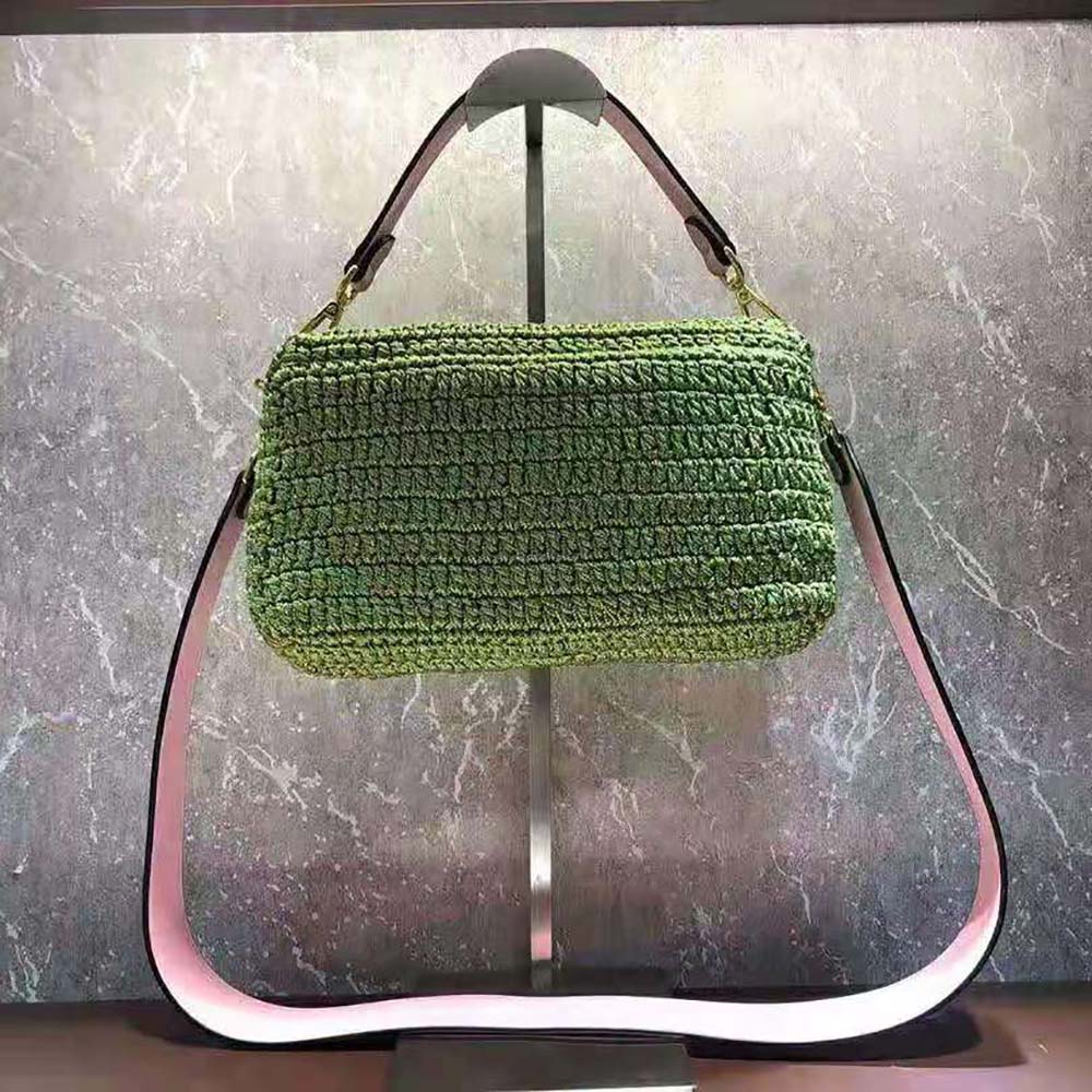 Side profile showing compact silhouette of Fendi Women Baguette Bag Green