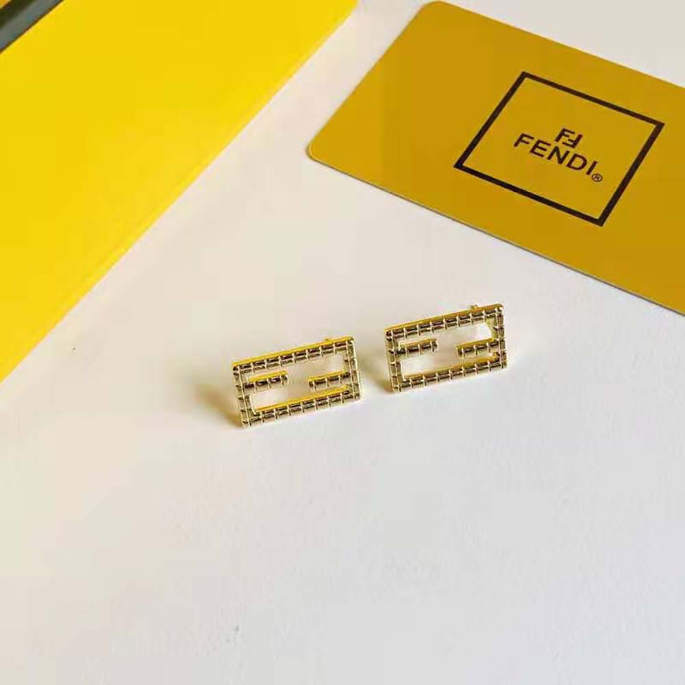 Side angle of Fendi Women Baguette Gold-color Earrings highlighting silhouette