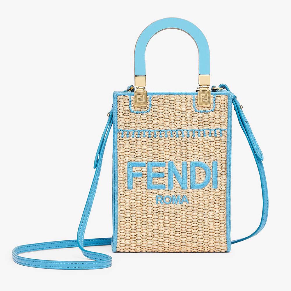 Front view of Fendi Women Mini Sunshine Shopper Braided Straw Mini-Bag in blue