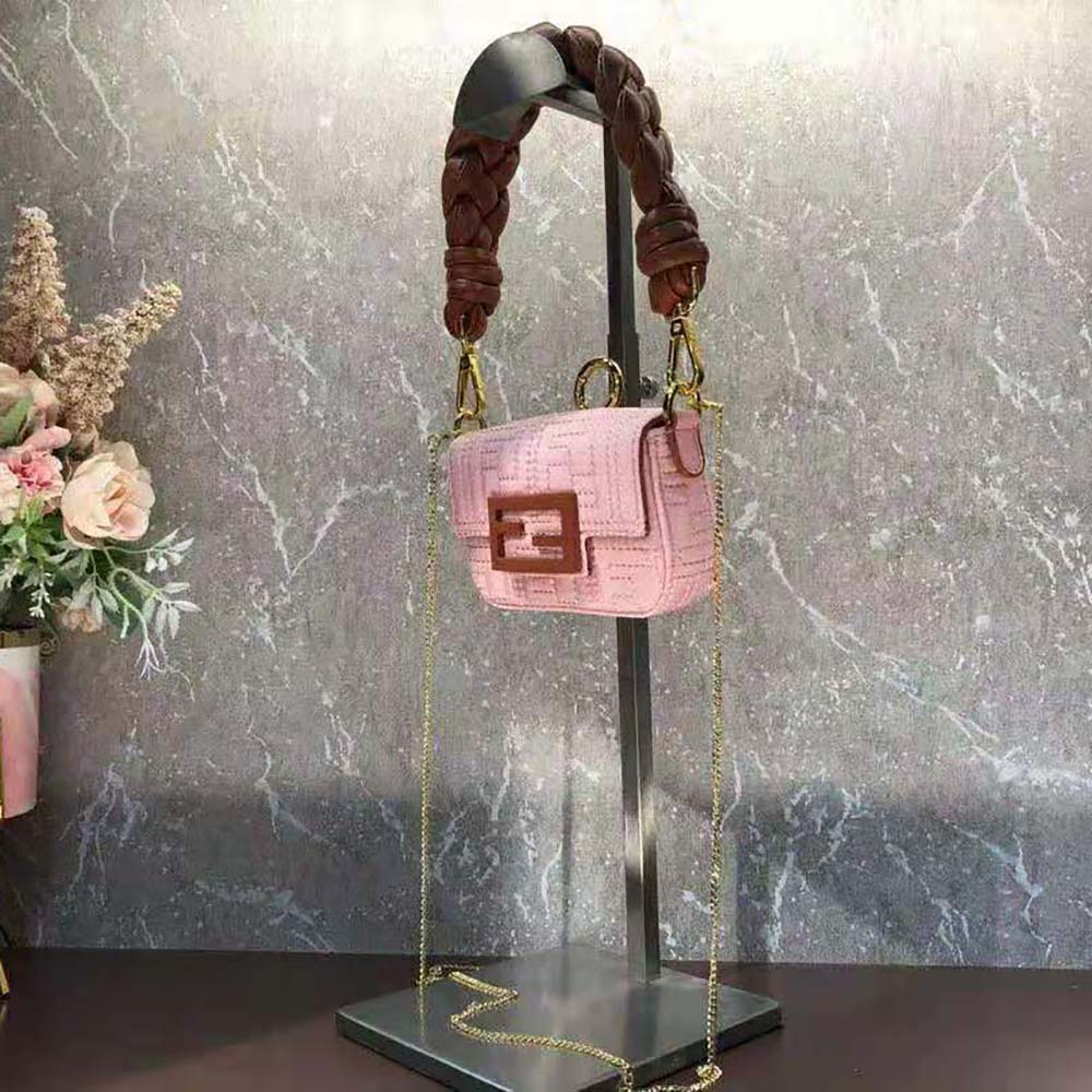 Side angle showing soft pink nylon texture and flap closure