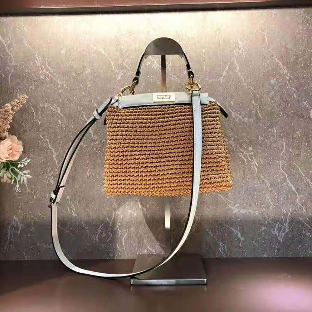 Close-up of gold-tone closure on Fendi Women Peekaboo Mini Cotton Crochet Bag-Brown