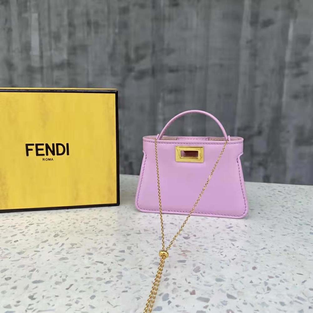 Close-up on gold-tone hardware of Fendi Women Pico Peekaboo Charm