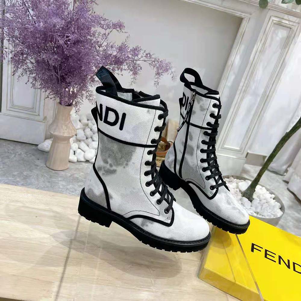 Close-up of black leather and canvas detail on Fendi Women Signature Boots