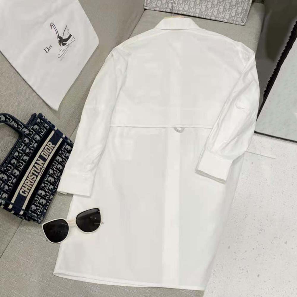 Side angle showing relaxed fit of Fendi shirt dress in white poplin