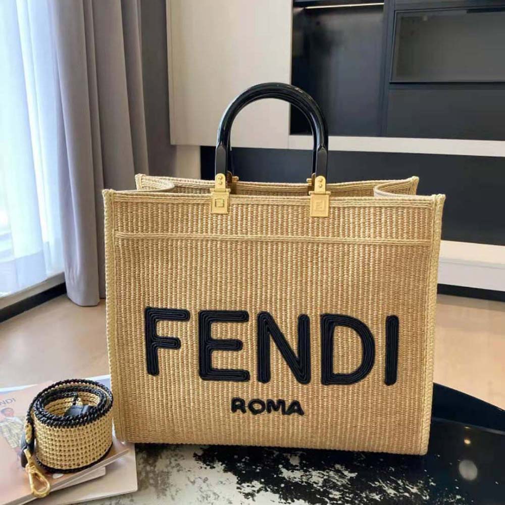 Close-up of embroidered detail and gold hardware on Fendi Sunshine shopper