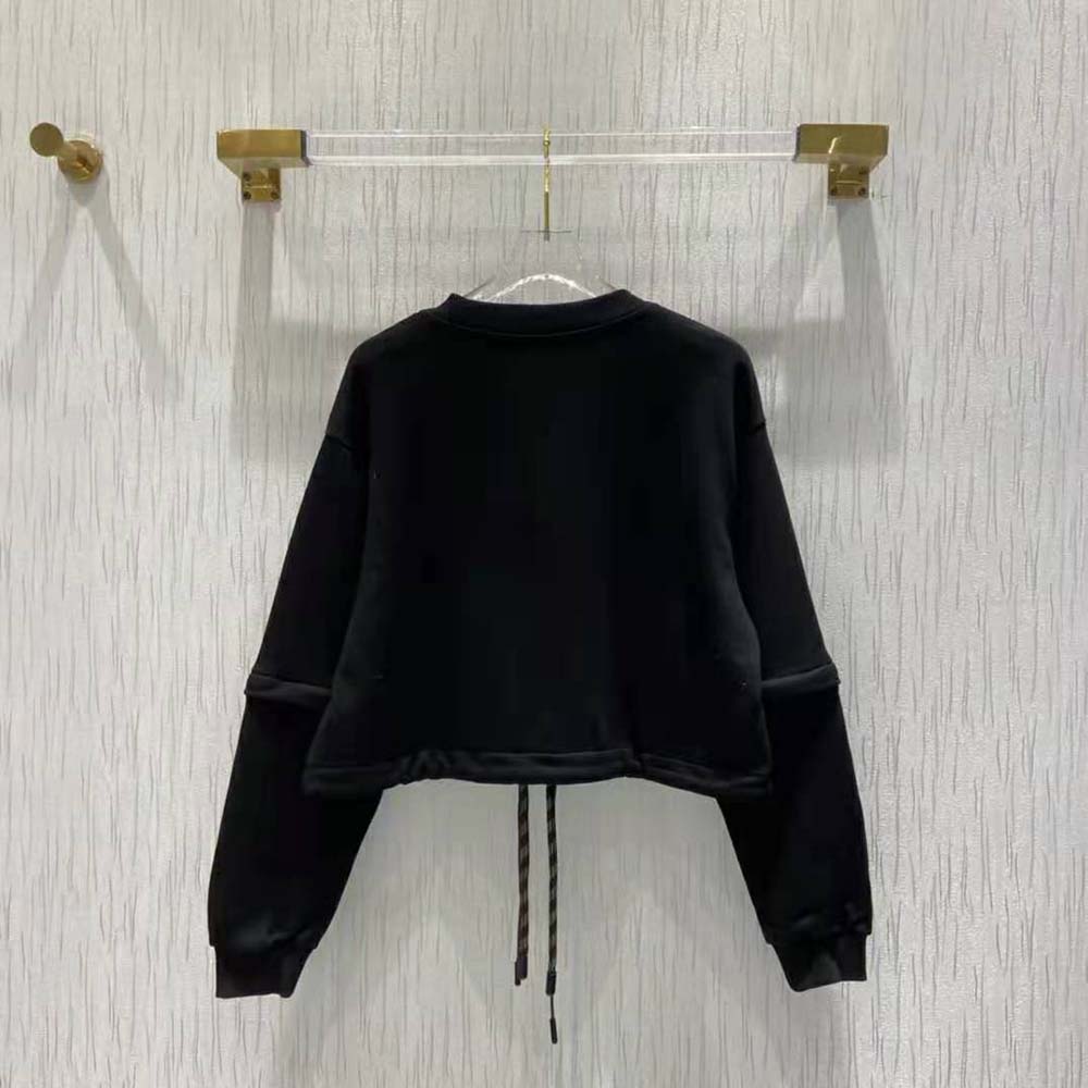 Side angle showcasing relaxed fit of Fendi Women Sweatshirt Black Jersey Sweatshirt