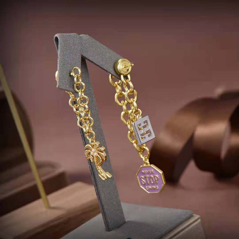 Side view of Givenchy Women Charms Asymmetrical Earrings showing length contrast