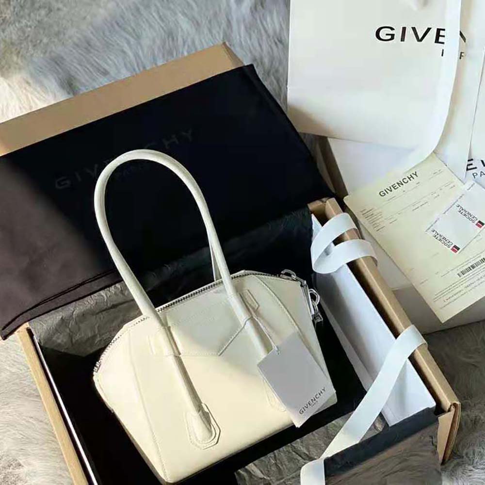 Close-up detail of metal lock on Givenchy Mini Antigona White leather