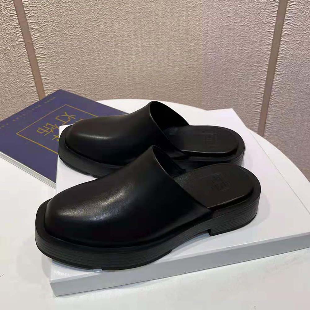 Close-up on signature metal hardware on Givenchy Women Squared Open Loafers