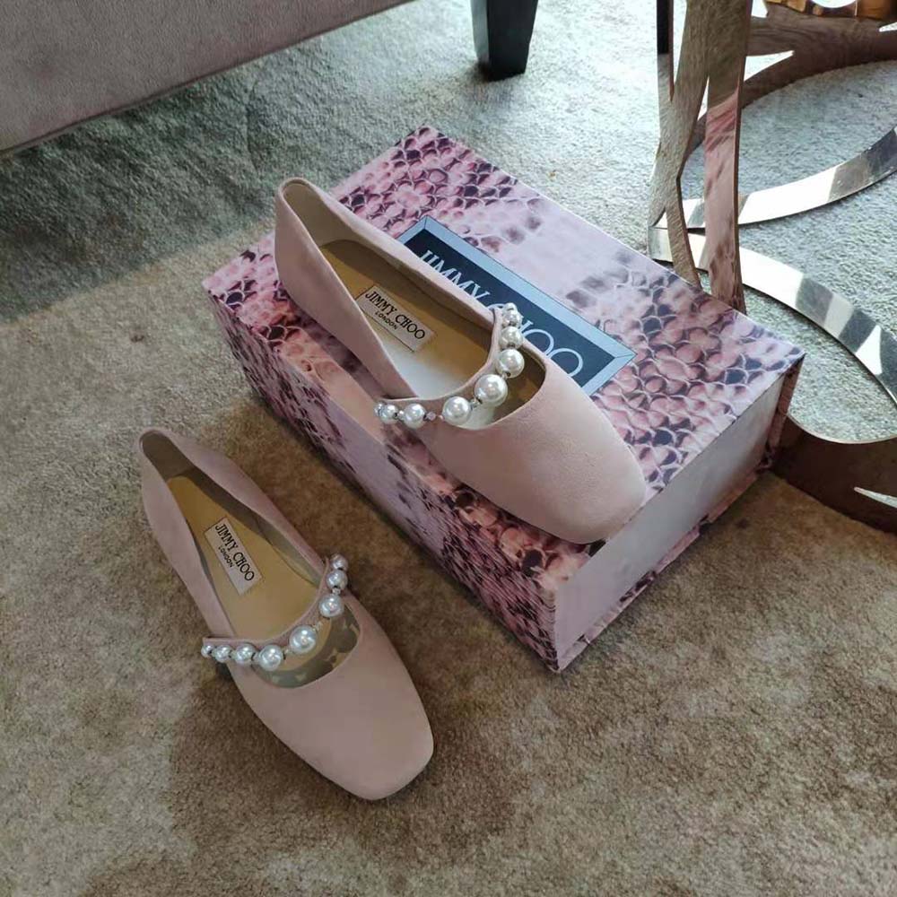 Top-down angle of Jimmy Choo Women Ade Pink Suede Ballet Flats showing silhouette