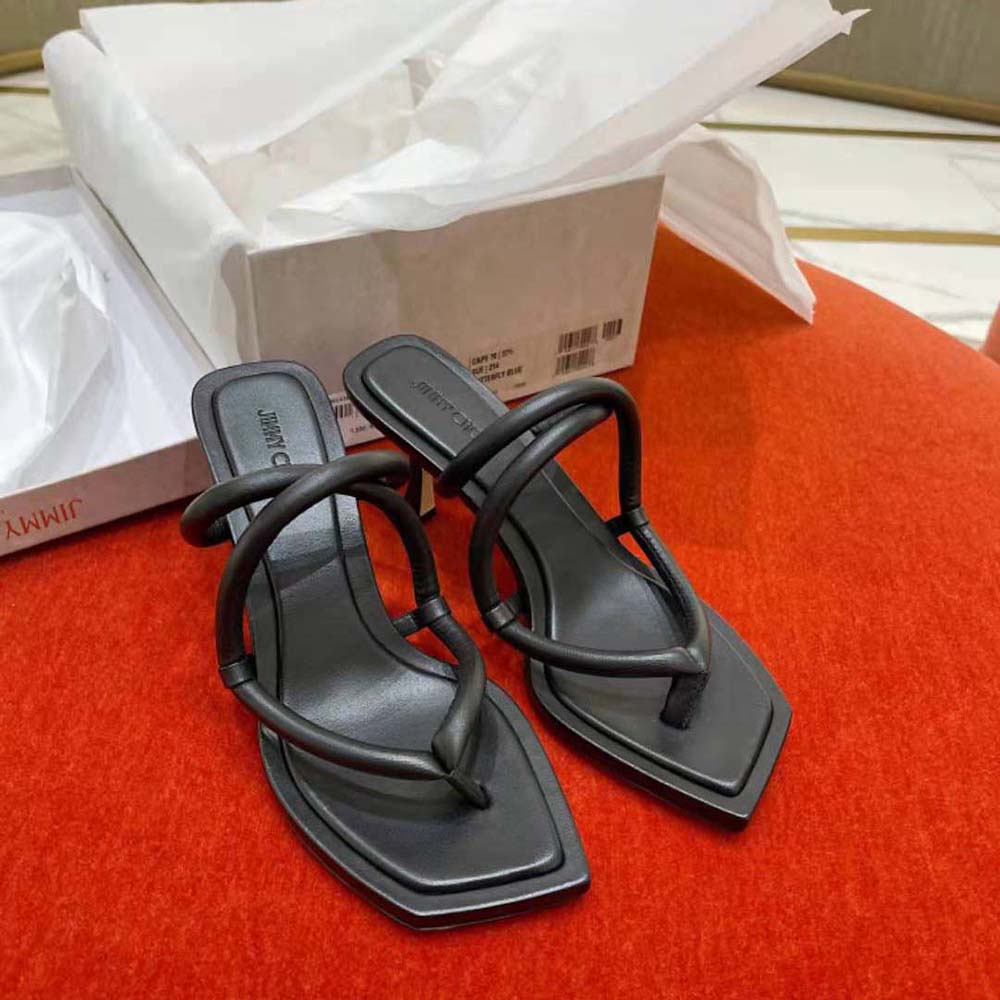 Close-up of black nappa leather and thong design on Jimmy Choo mules