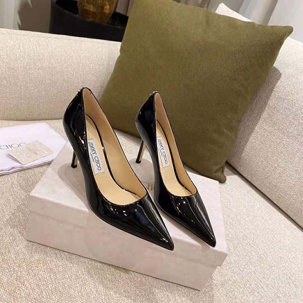 Close-up of JC emblem detail on Jimmy Choo Women Love 100 Black Patent Leather Pumps