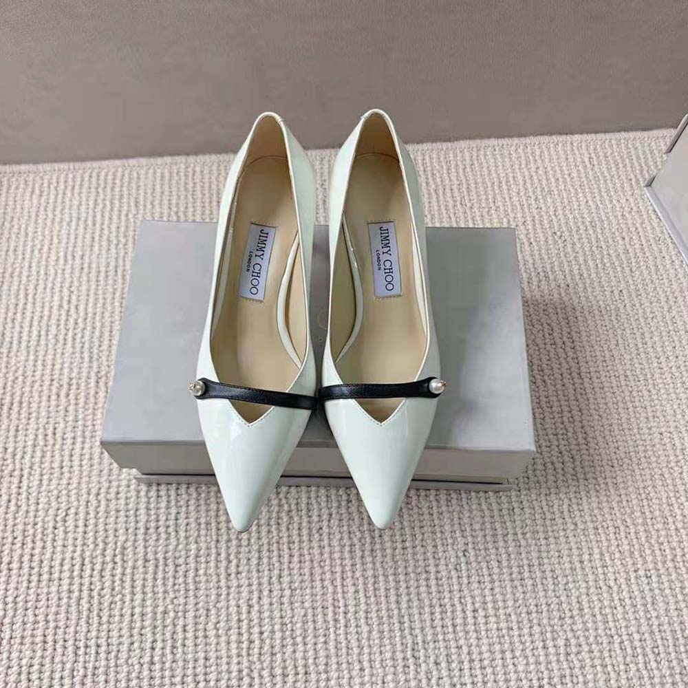 Close-up of pearl detail on Jimmy Choo Women Rosalia 65 Latte Patent Pumps