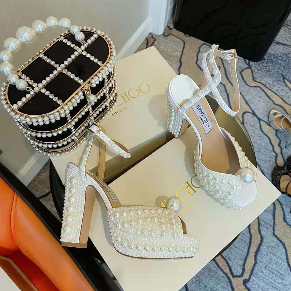 Close-up of pearl embellishments on Jimmy Choo Women Sacaria/pf 120 sandals