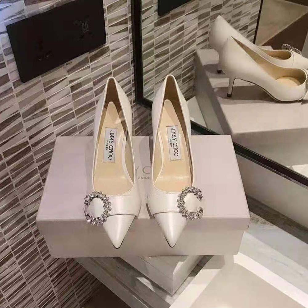Close-up of crystal embellishment on Jimmy Choo Women Saresa 65 pumps