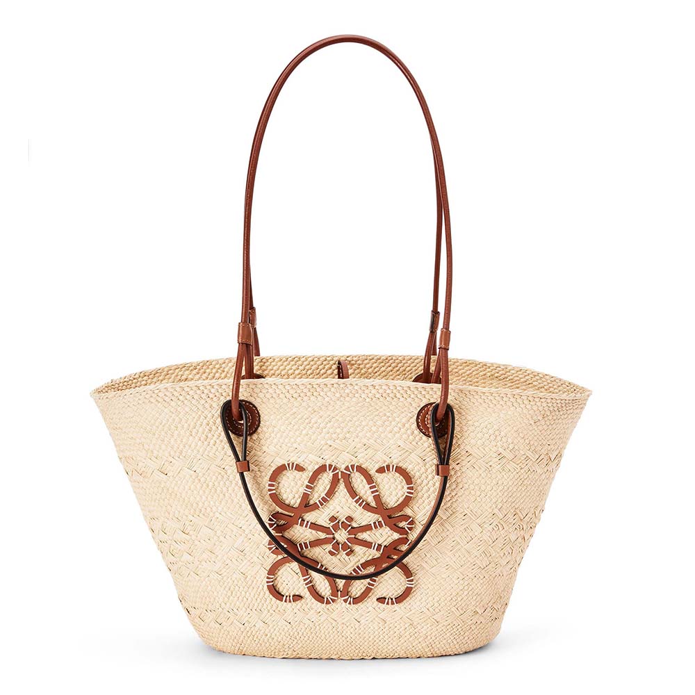 Front angle of Loewe Women Medium Anagram Basket Bag beige leather flap