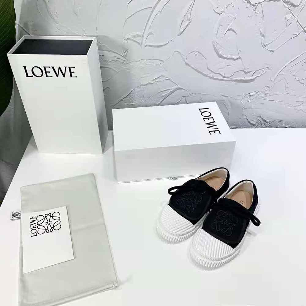 Close-up of signature Anagram flap on Loewe canvas sneaker