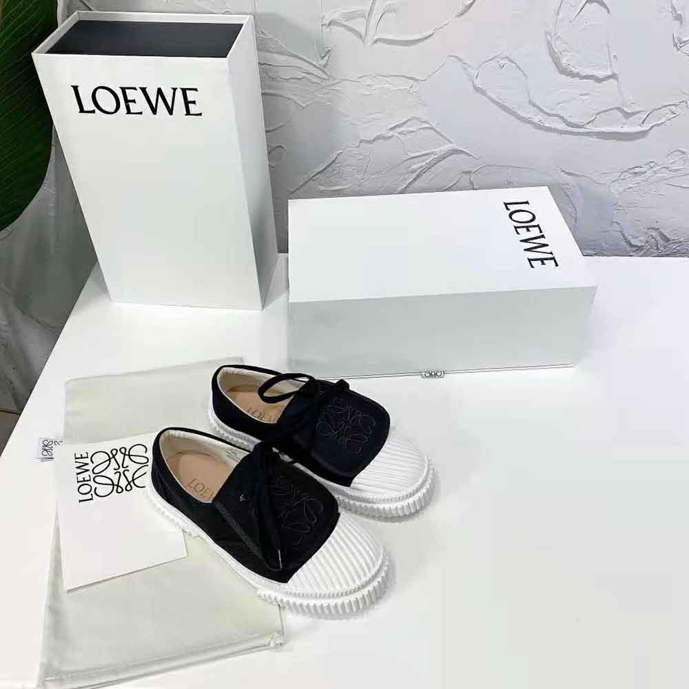 Overhead shot showing sole and canvas texture of Loewe sneaker
