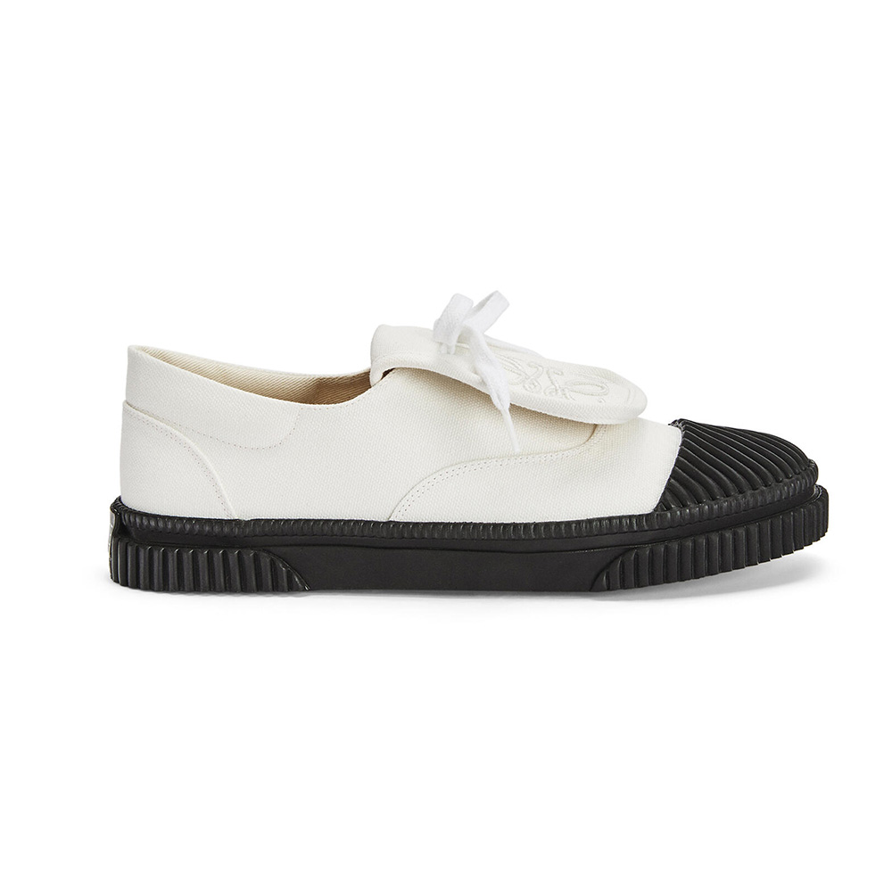 Side view of Loewe Women Anagram Flap Sneaker in Canvas-White