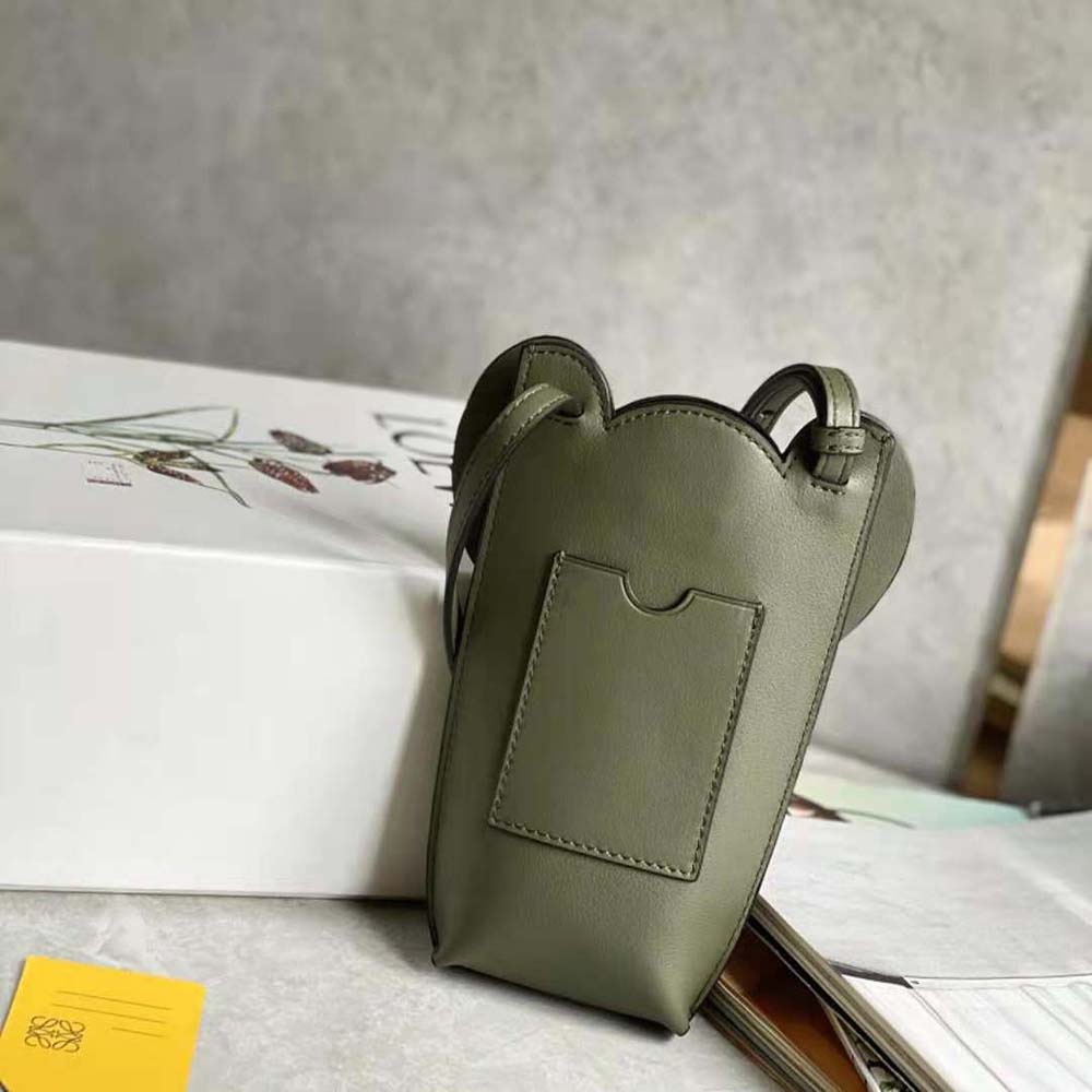 Side angle showing gold-tone hardware on Loewe Women Elephant Pocket