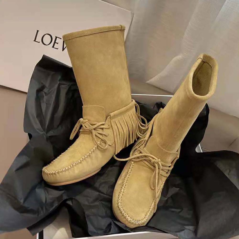 Top-down angle of Loewe Women Fringed Soft Boot leather texture