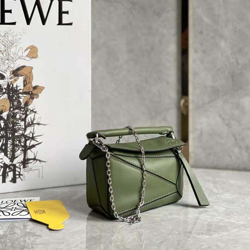 Side angle of Loewe Women Nano Puzzle Bag showing silver hardware