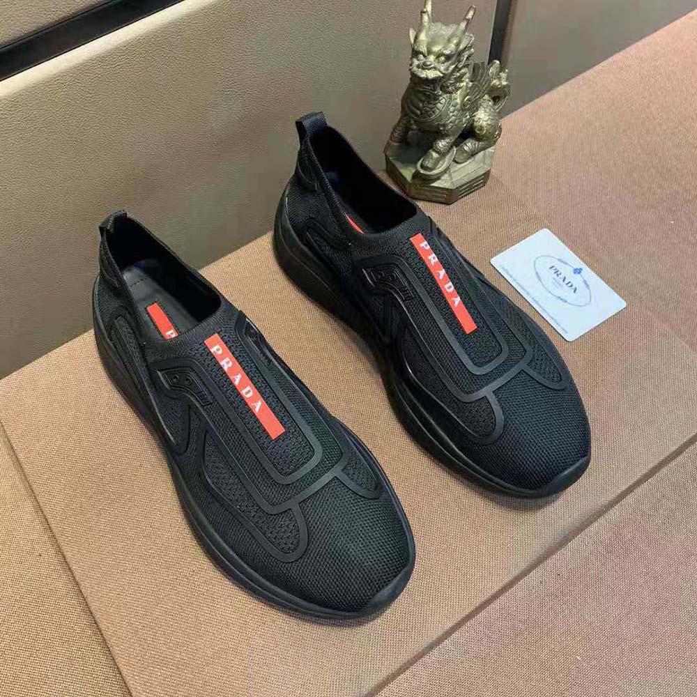 Close-up of lace-up closure on Prada Men Bike Knit Sneakers-Black