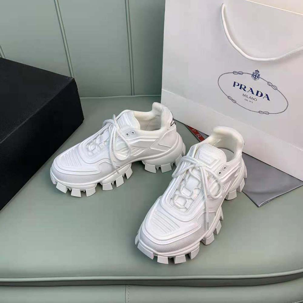 Close-up of white mesh and logo hardware on Prada Women Cloudbust Thunder Sneakers-White
