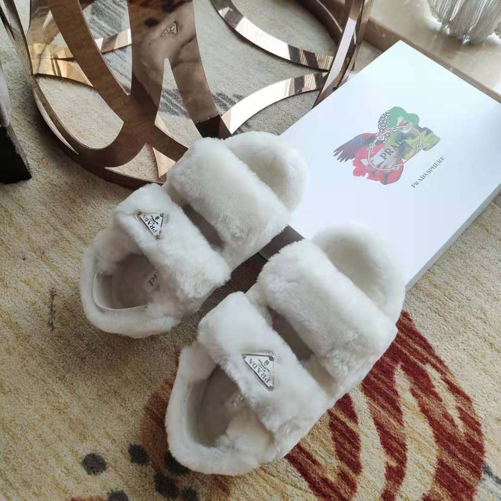 Side profile showcasing chunky sole of Prada Women Movement and Comfort Come Together Shearling Sandals