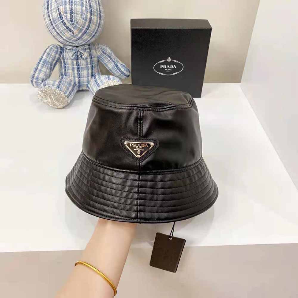 Side angle showing brim and embossed Prada logo on bucket hat