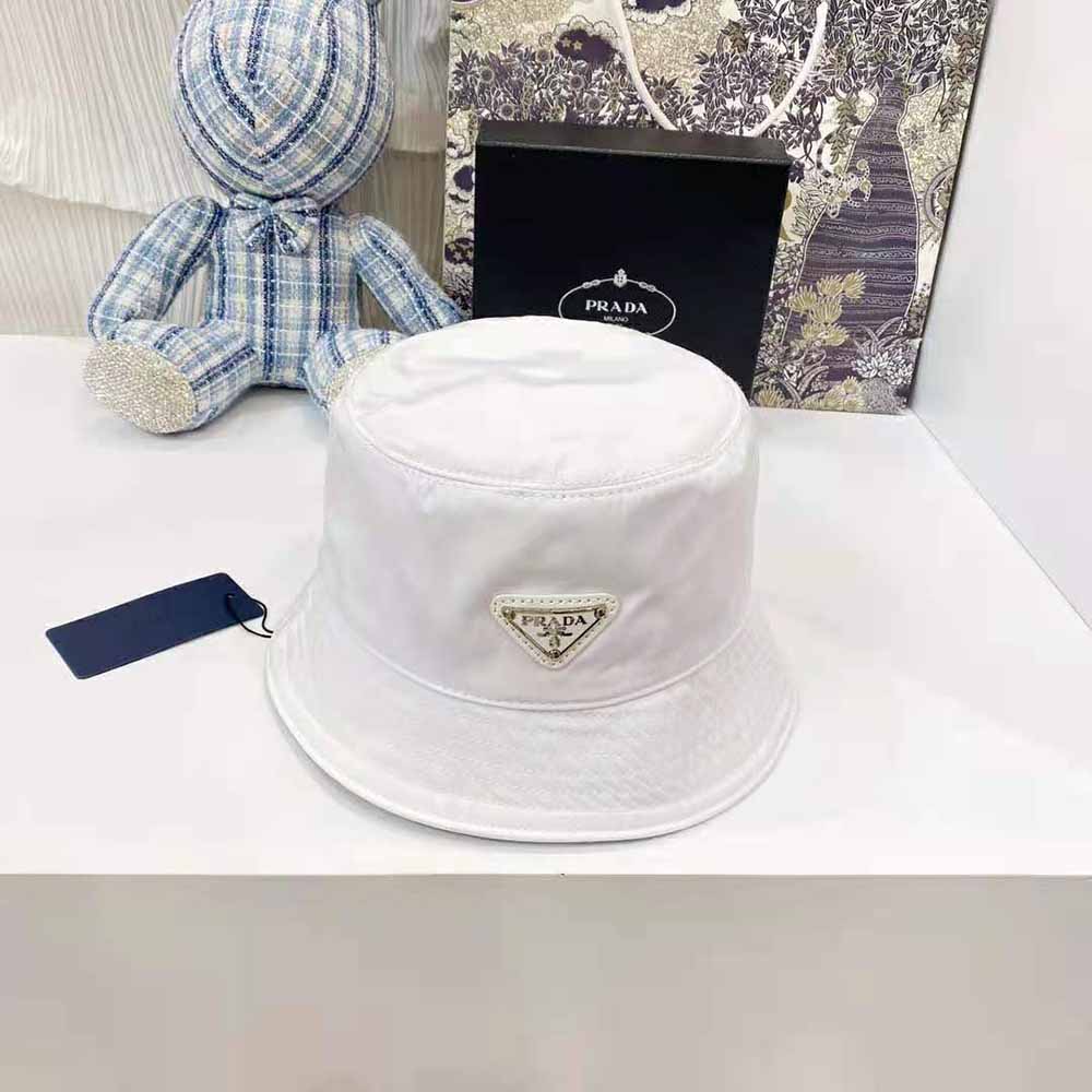 Side angle showing adjustable inner drawcord on Prada nylon bucket hat
