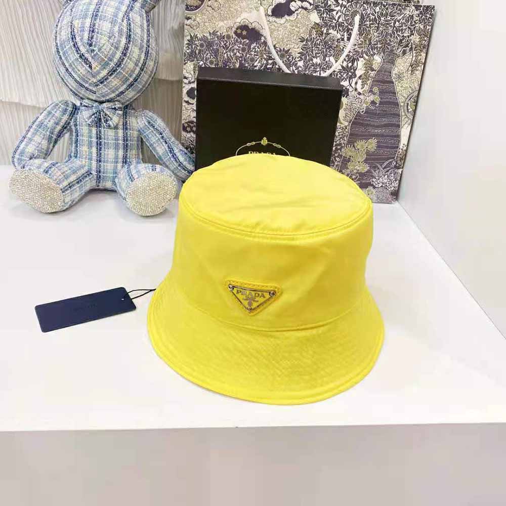Side view showing adjustable strap on Prada Women Nylon Bucket Hat Yellow