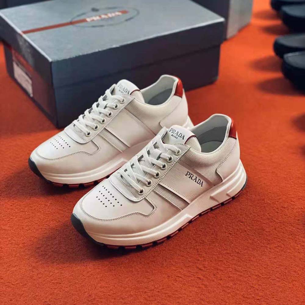 Top-down view of Prada Women Prax 01 Sneakers-White lace-up front