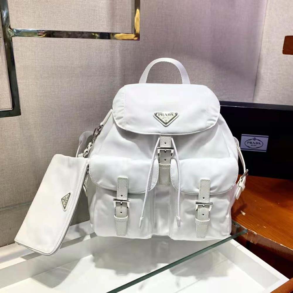 Close-up of silver-tone closure on Prada Women Re-Nylon Medium Backpack-White