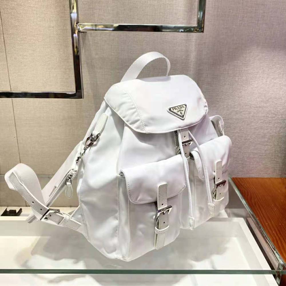 Side angle showing adjustable straps of Prada Women Re-Nylon Medium Backpack-White